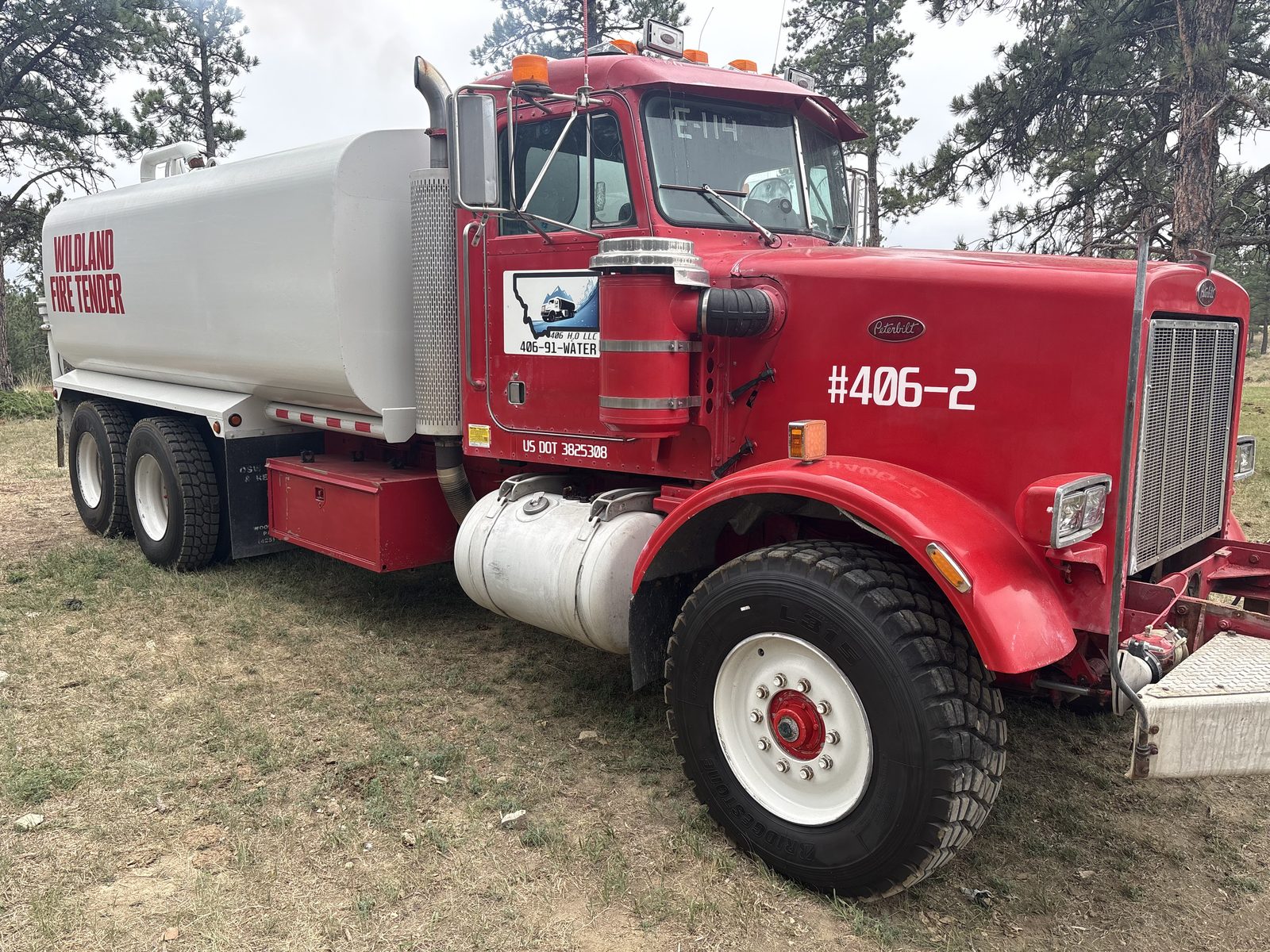 Red Peterbilt 349 wildland fire tender #406-2 with a 4,000-gallon tank